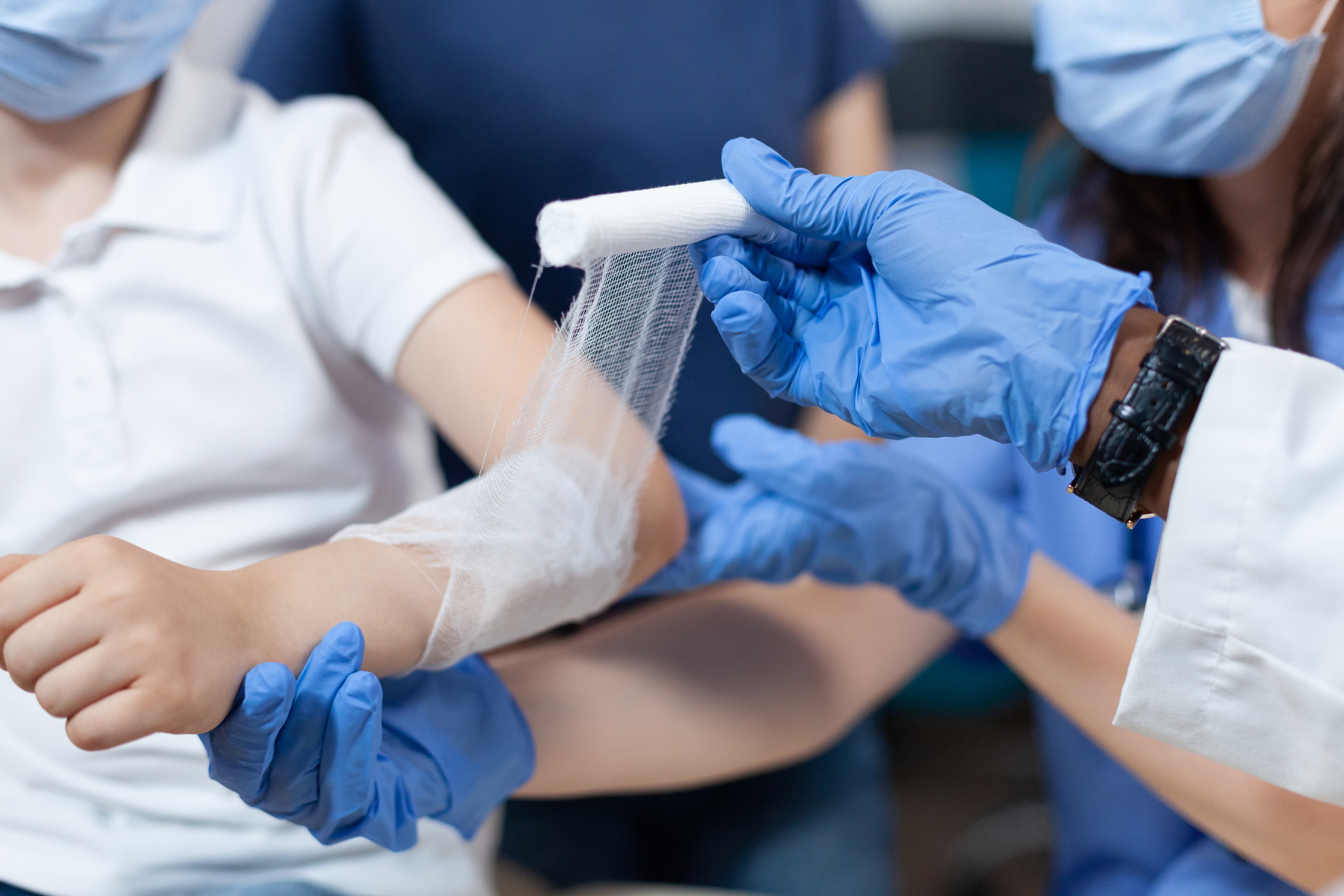 COCN-AP Exam Prep - Wound Care Nursing Review COCN-AP exam prep - medical staff providing care to a child patient | Wound Care Nursing Review