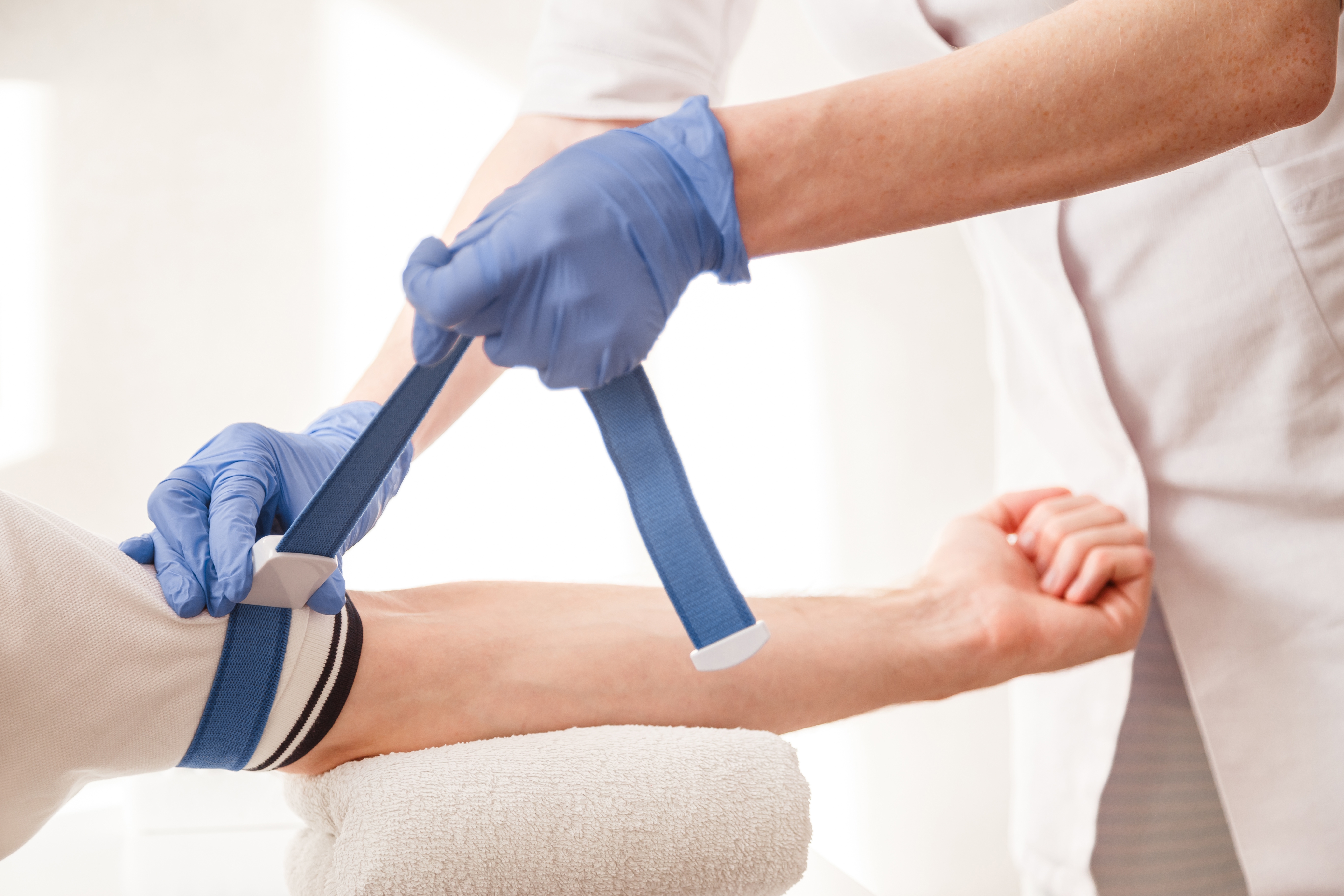 CCCN Exam Resources - Wound Care Nursing Review CCCN exam resources - clinician preparing arm for care procedure | Wound Care Nursing Review